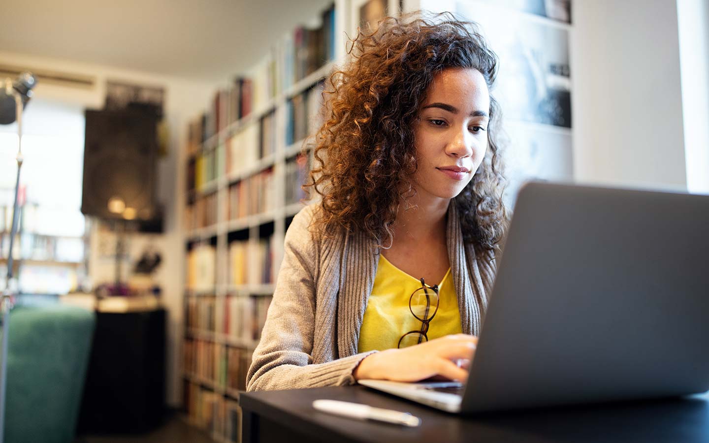 Student sat at laptop